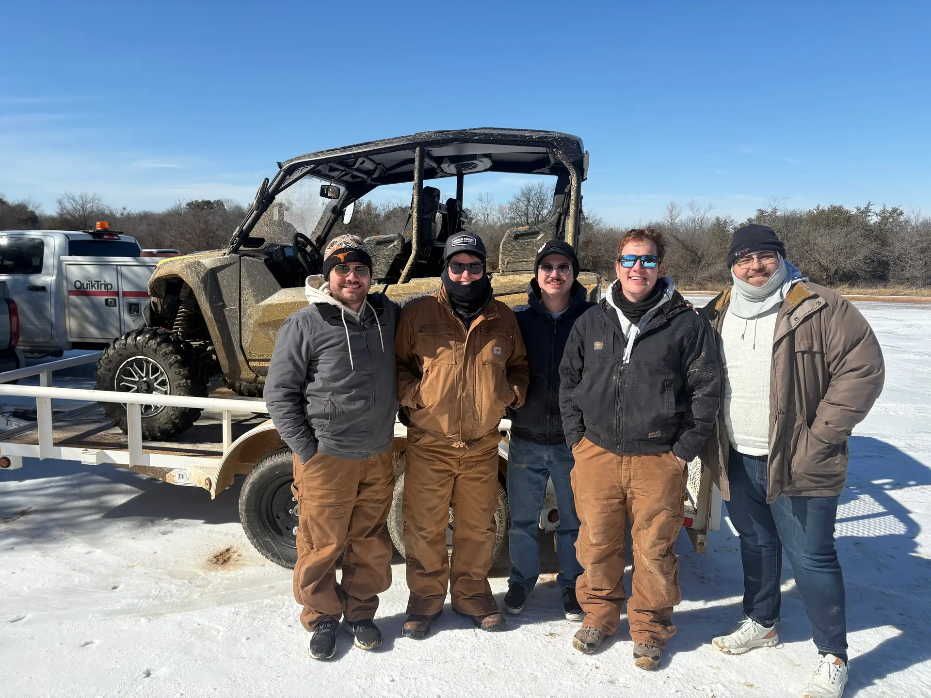 Group ATV and UTV ride in the snow at the Texas off-road park
