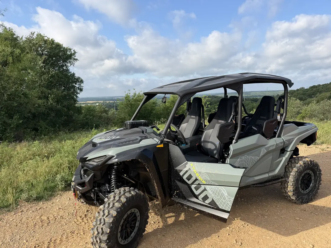 Yamaha Wolverine RMAX4 1000 XTR side-by-side on a Texas hilltop trail